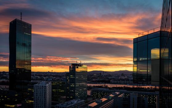 Dawn over Vienna skyscrapers and Danube